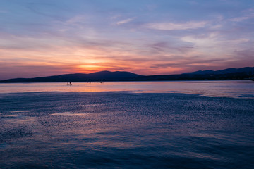 SAP surfing at sunset in Gelendzhik, Krasnodar region.