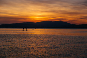 SAP surfing at sunset in Gelendzhik, Krasnodar region.