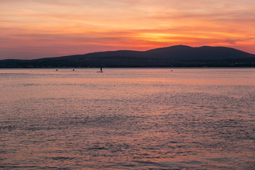 SAP surfing at sunset in Gelendzhik, Krasnodar region.