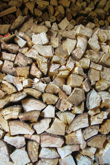 Stacks of Firewood. Firewood background. Background of dry chopped firewood. Wooden background