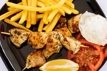 chicken sticks on barbecue