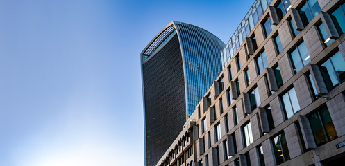 Modern skyscrapers towering over other buildings