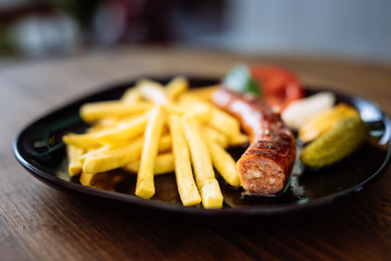 Grilled sausage on plate