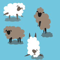 figurines of sheep in different positions white and grey pattern