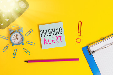 Handwriting text writing Phishing Alert. Conceptual photo aware to fraudulent attempt to obtain...