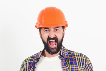 Industrial worker. Hard work. Portrait of screaming bearded builder. Worker in protect helmet. Professional builder with safety helmet.