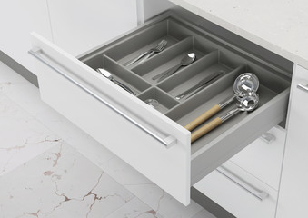 Open kitchen drawer with cooking utensils. Storage and organization of the kitchen. 3d rendering.