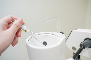 close up Cesium 137(CS-131)Radioactive isotopes used for Iodine uptake machine calibration before iodine uptake diagnosis.