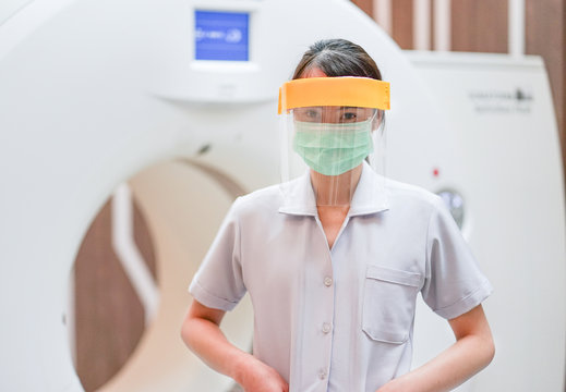 Medical Staff Wearing Face Shield And Medical Mask For Protect Coronavirus Covid-19 Virus In Hospital, Protective Epidemic Virus Outbreak Concept