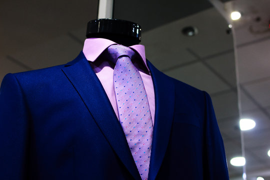 classic suit with a tie on a mannequin