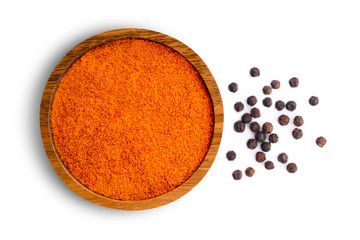 Turmeric and black pepper isolated on white.