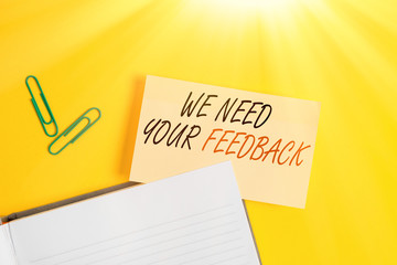Writing note showing We Need Your Feedback. Business concept for criticism given to say can be done...
