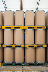 oil barrels or chemical drums stacked up, barrels made from fiber