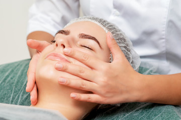 Fototapeta na wymiar Head massage of woman.
