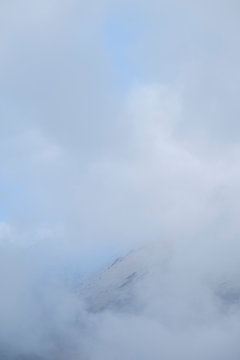 Clouds cover the top of a mountain near Assergi, Italy © andrea
