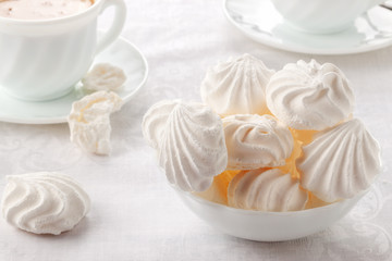 Tender, airy Bizet and a cup of fresh coffee with cream