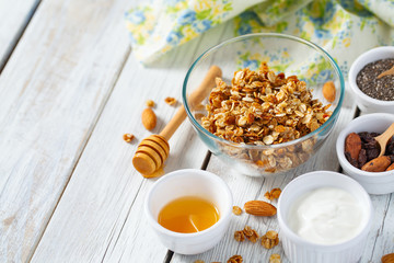 breakfast with granola on wooden surface