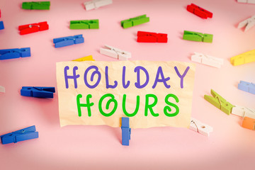 Text sign showing Holiday Hours. Business photo showcasing Overtime work on for employees under...