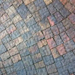 masonry wall paving stones as a background close up