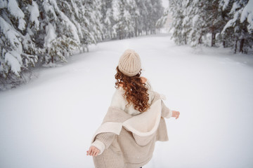 happy girl in winter forest