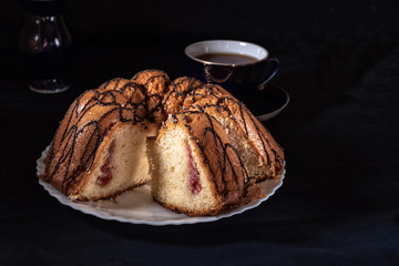 Homemade cake with strawberry jam and cream