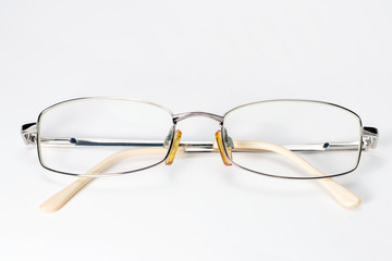 Glasses on isolated white Optic glasses. close up