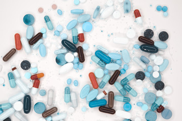 various Pharmaceutical tablets, capsules, therapy drugs and pills on white background