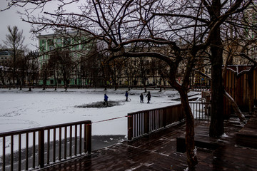 Moscow, Chistoprudniy Blvd.  / Children play hockey on "Chistye Prudy".