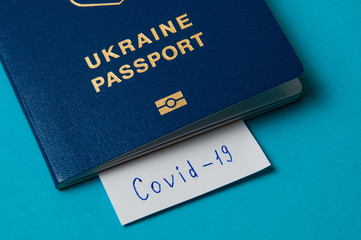 Coronavirus and travel concept. Note the coronavirus COVID-19 and passport. A new outbreak of the corona virus.
