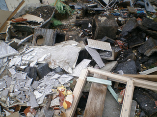 pile of garbage thrown in a garden