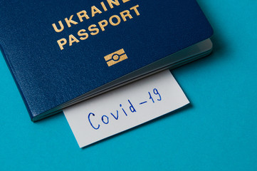 Coronavirus and travel concept. Note the coronavirus COVID-19 and passport. A new outbreak of the corona virus.