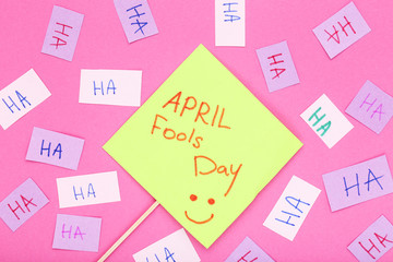 Text April Fool's Day on pink background