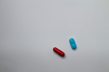 Colored pills on white background Legal drugs in the form of tablets. Medicines for use in humans.
