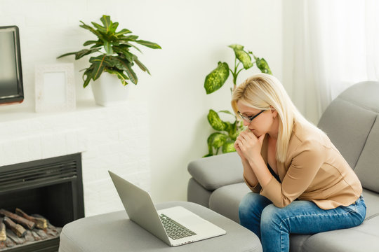 Work during quarantine, a woman at home works on the laptop