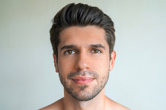 Portrait of a young gorgeous healthy latin male with a perfect skin and amazing hair 