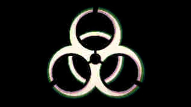 Video animation of a television screen showing Biohazard symbol . With noise, vintage film overlay and abstract glitch effect