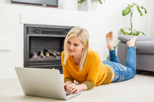 Work during quarantine, a woman at home works on the laptop
