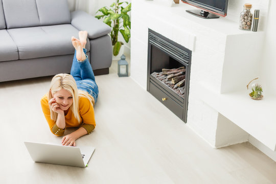 Work during quarantine, a woman at home works on the laptop
