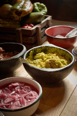 guacamole and garnishes for tacos and chili