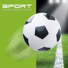 Obraz premium Soccer ball on green stadium
