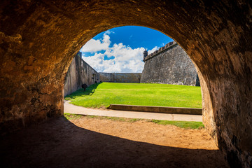 Peeking under one of the many archways of the historic Castillo San Felipe del Morro fort in San Juan, Puerto Rico.