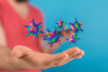 Hologram of coronavirus COVID-2019 on a blue futuristic background. Deadly type of virus 2019-nCoV....