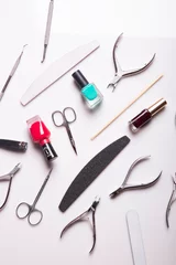 Fotobehang professional manicure tools on a white background. © grigoryepremyan