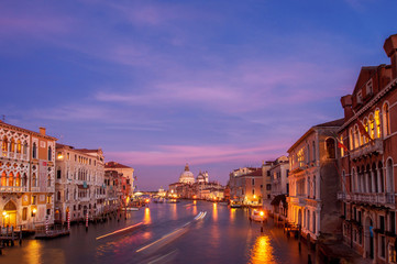 Fototapeta na wymiar Grand Canal and Santa Maria della Salute on sunset. Venice, Italy. picture with long exposure