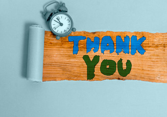 Writing note showing Thank You. Business concept for a polite expression used when acknowledging a...