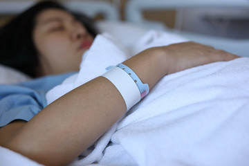 Obraz na płótnie Canvas wristband id blank name tags on arm patient