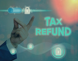 Conceptual hand writing showing Tax Refund. Concept meaning refund on tax when the tax liability is...