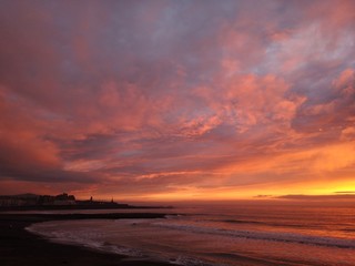 Fototapeta na wymiar Dramatic seaside sunset