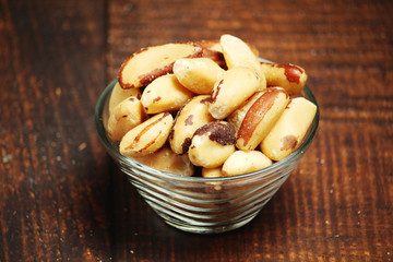 A bowl with peeled Brazil nuts	
