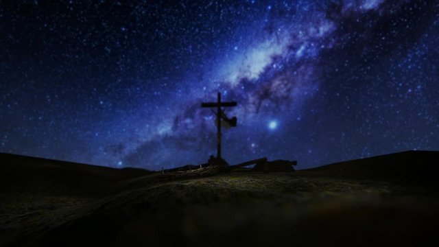 Crucifixion of Jesus Christ with thorn crown, nails, hammer and a rope against milky way starry sky, til